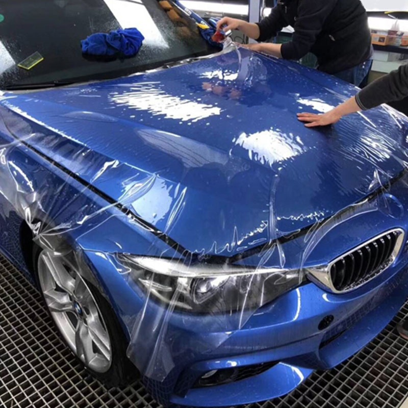 PPF Detailing Car Medina xpel-stealth-vs-xpel-gloss-ppf-on-the-red-multi-coat-tesla-model-y
